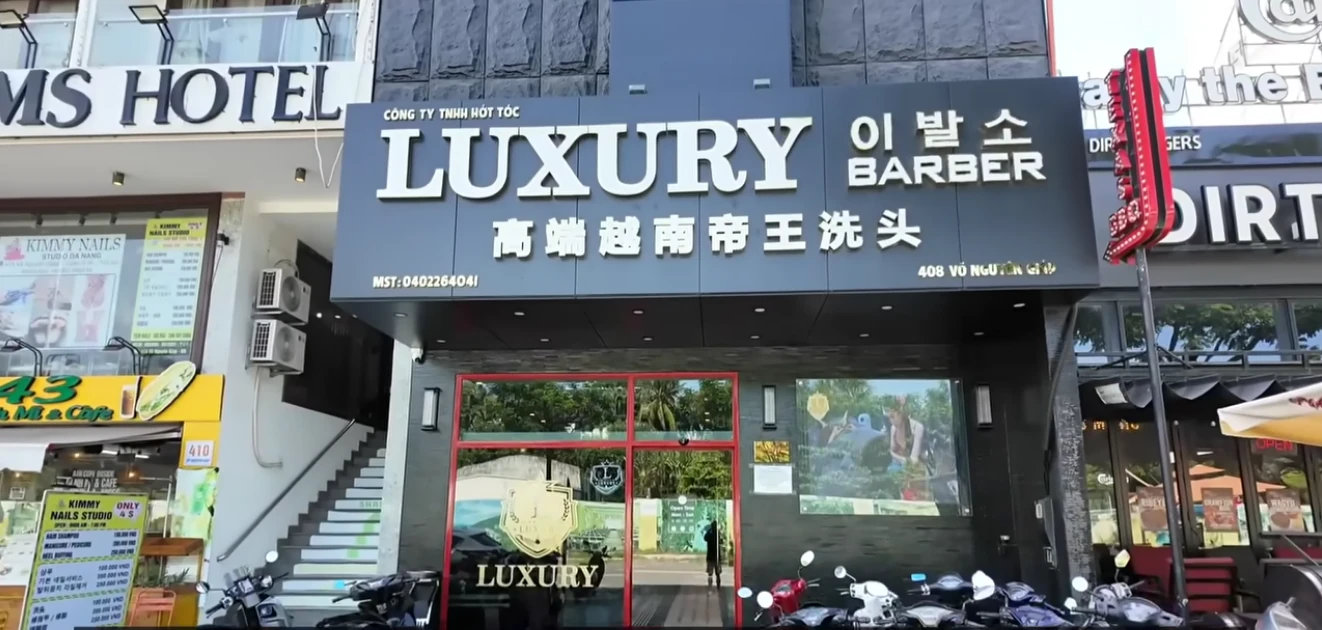Luxury Barbershop — Front and barber pole
